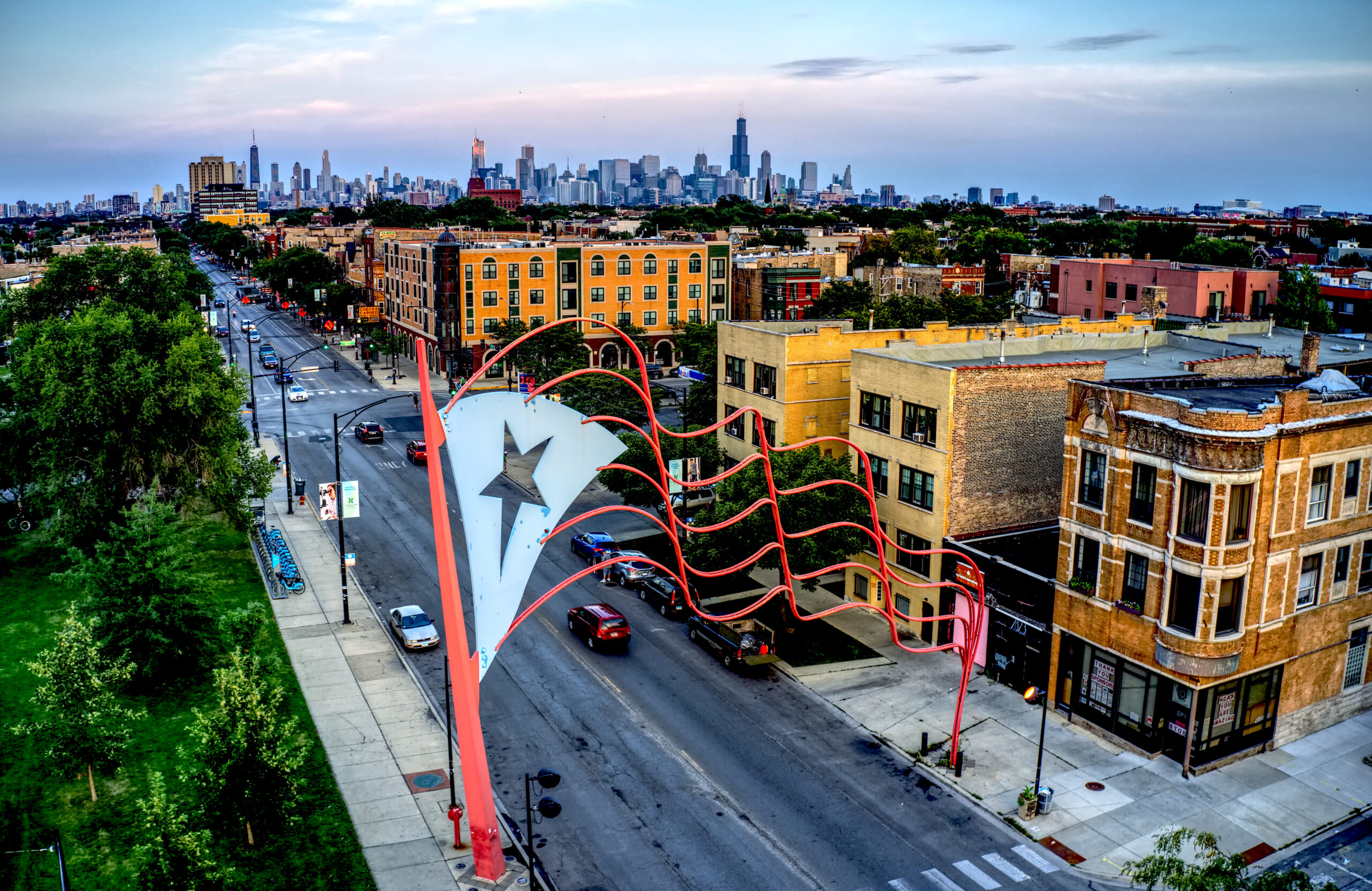 A picturesque view of the historic boathouse and lagoon in Humboldt Park, Chicago.